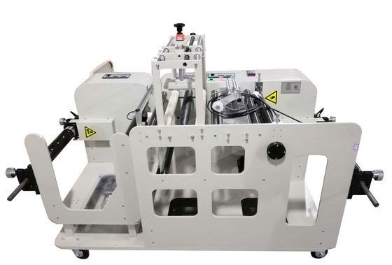 Machine de remontage pour le marquage et le codage des films